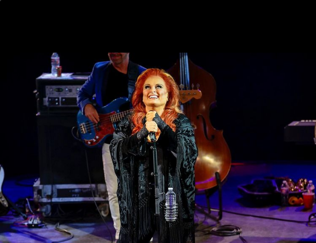 Wynonna Judd perfoming in one oh her shows.